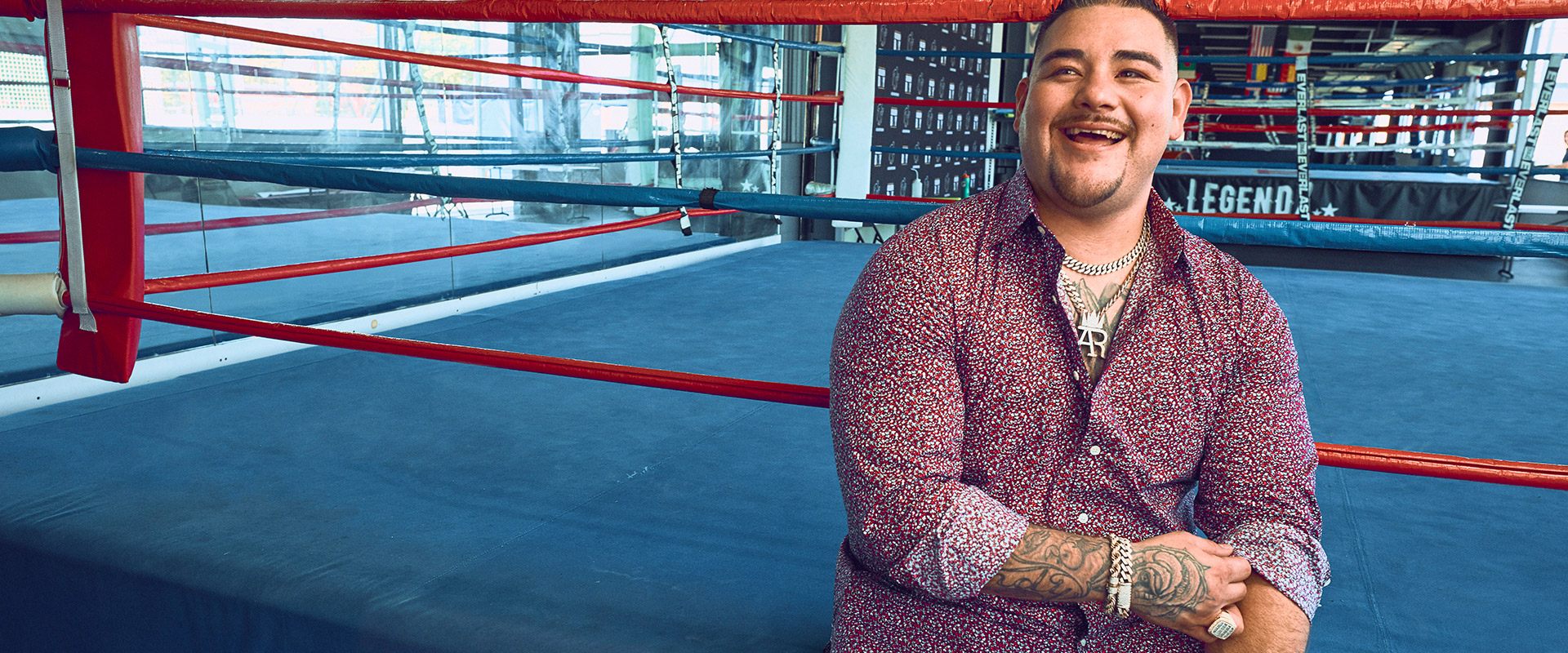 Andy sitting next to the boxing ring