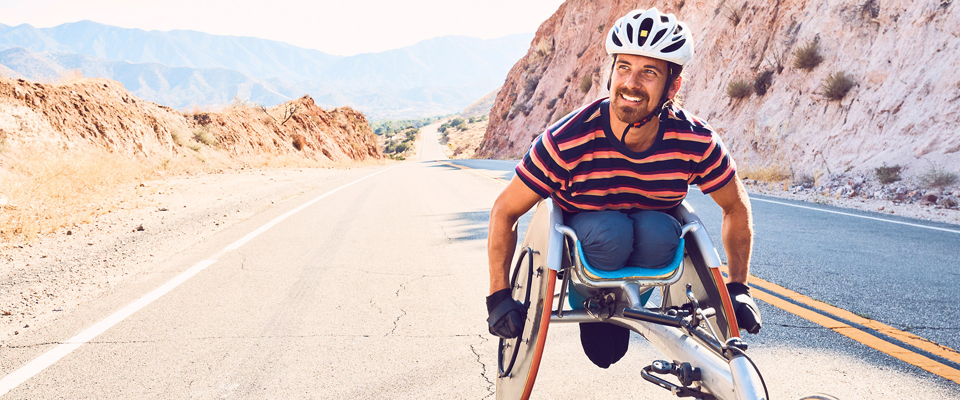 Justin racing down a road, wearing Bonobos